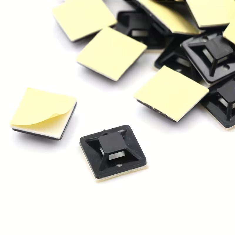 Black self-adhesive cable tie mounts with peel-off backing