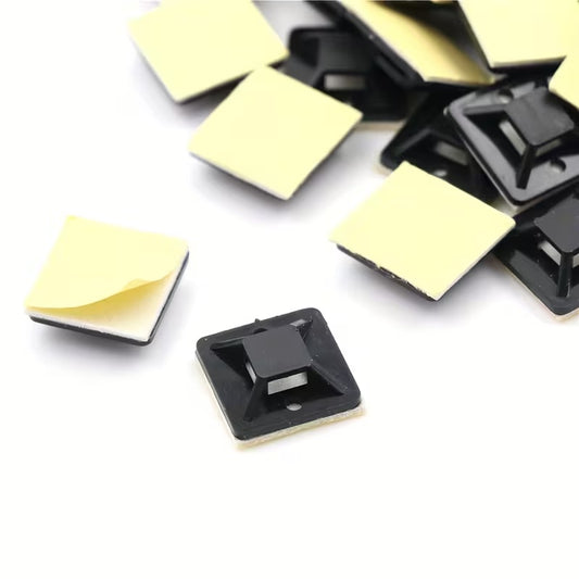 Black self-adhesive cable tie mounts with peel-off backing